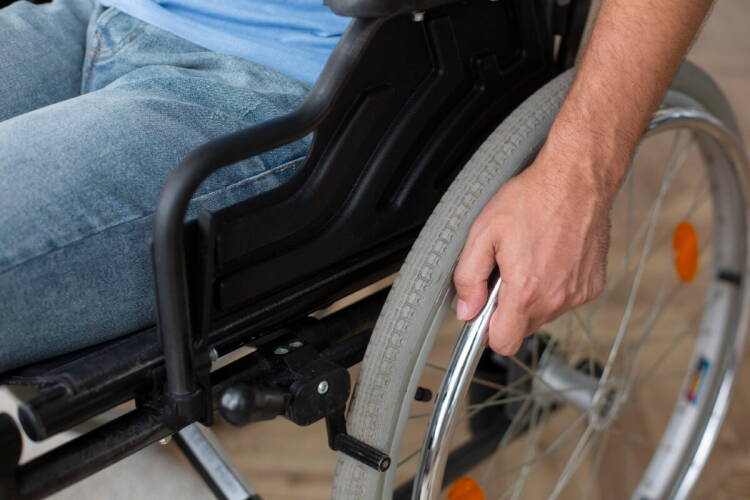 Persona en Silla de Ruedas
