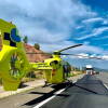 Helicóptero posado en carretera