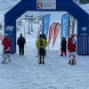 Varios esquiadores sobre la nieve, formando el pódium de la categoría