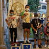 Pódium con tres ganadores