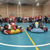 Dos karts expuestos junto a los stands informativos durante la Feria de Bienvenida de la USAL en Béjar